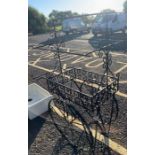 An iron garden planter in the form of a trolley