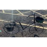 An iron bicycle planter