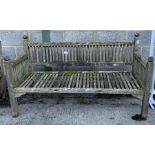 Large weathered teak garden bench