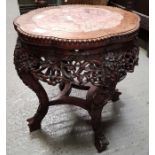 A Chinese hardwood occasional table with a marble