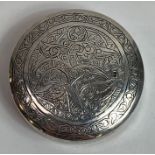 A modern Egyptian silver engraved circular box and