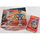 A vintage radio controlled robot, boxed, along wit