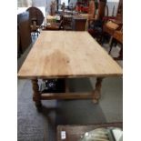 A Victorian and later pine kitchen table, on four