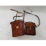 Two vintage leather messenger bags, each with addit