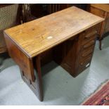 A 20th century oak desk, with a drop down section