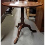 A 19th century mahogany tilt top table, standing o