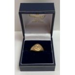 A 9 carat gold signet ring, crested, finger size N