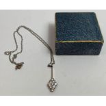 An Edwardian diamond cluster pendant, the nine sto