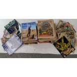 A collection of various comics and magazines