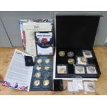 A quantity of WWII commemorative coins issued by W