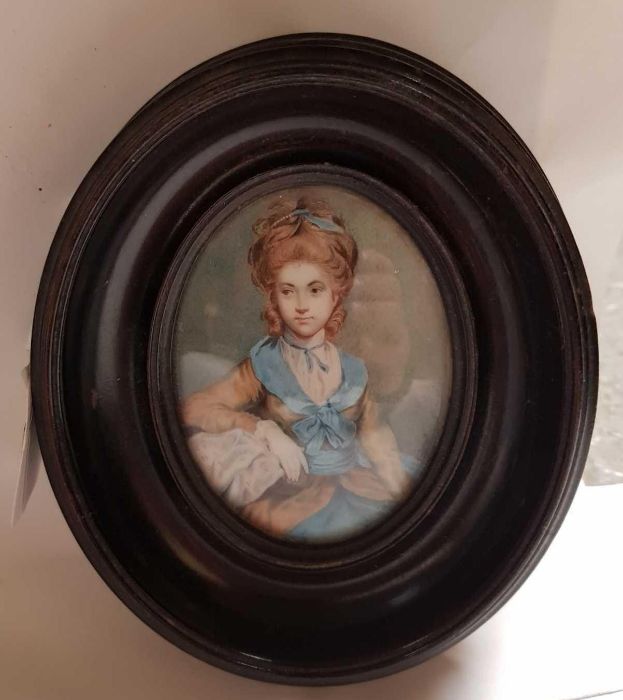 An early 19th century portrait miniature of a fema