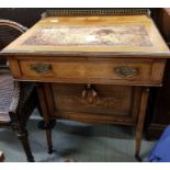 A Victorian inlaid writing desk, with a small leat
