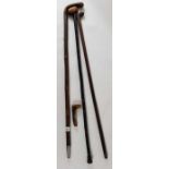 A 20th century leather covered stick, 92.5cm long;