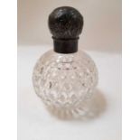 A late Victorian silver mounted glass scent bottle