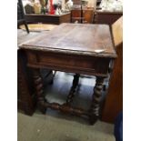 A Victorian dark oak hall table, the two short dra