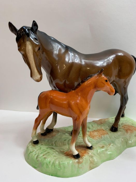 A Beswick group of a mare and foal standing on gra - Image 2 of 3