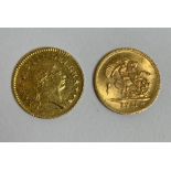 A gold 1806 half guinea coin and a 1911 quarter so