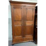 A 20th century mahogany hardwood two door kitchen