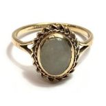 A 9 carat gold jade set ring, finger size M, 2.2 g