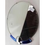 A 20th century round wall mirror, with unusual blu