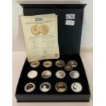Thirteen assorted WWII commemorative coins in case