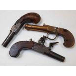 A collection of three pocket pistols, flintlock co