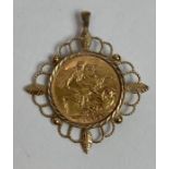 An 1894 full sovereign in a gold pendant mount wit