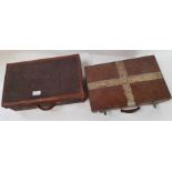 A vintage leather travelling suitcase, along with