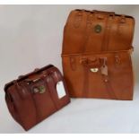 A set of three leather Gladstone/doctors leather b