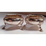 A pair of 18th century silver cauldron salt cellar