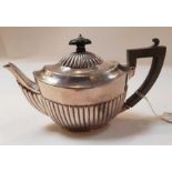 A late Victorian silver bachelor tea pot, by W & J
