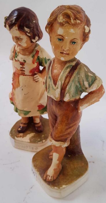 A pair of chalk ware figures of a boy and girl, 28 - Image 2 of 3