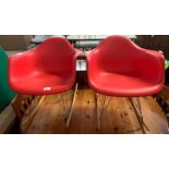 2 red plastic seat rocking chairs, condition reque