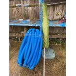 Parasol with base & blue plastic tubing, condition