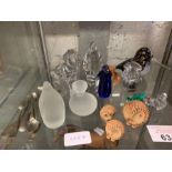 Shelf of glass animals, pottery owls & silver spoo