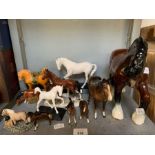 Shelf of Horse statues to include Beswick examples,