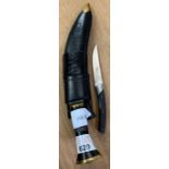 Leather cased brass tipped machete with 1 other kn