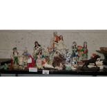 Shelf of figures & ornaments to include some Wade,