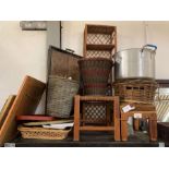 Shelf of wicker baskets, footstools, shelving unit