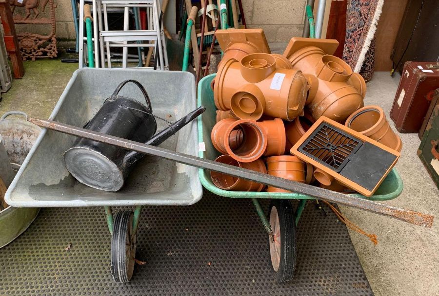 2 wheelbarrows, metal coal scuttle, watering cans