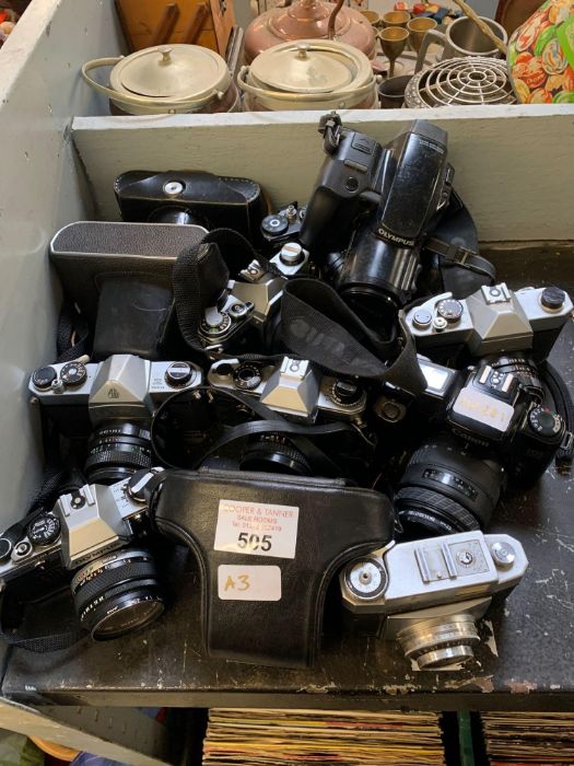 Part shelf of cameras to include Canon, Olympus, C