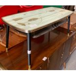 Glass top table on black spindle legs, condition r