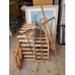 2 wooden wine racks, a music stand & 2 artists eas