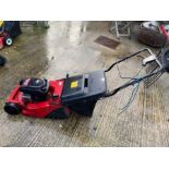 Red petrol lawnmower, condition requests and addit
