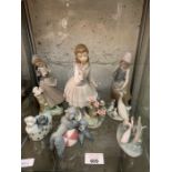 Collection of Nao figurines of girls & animals, co