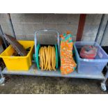 Shelf of items to include a hose reel, metal oil c
