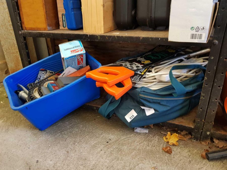 Shelf of tools, 2 hand saws & bag of electric cabl