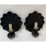 A pair of metal wall lights/sconces each with a sh
