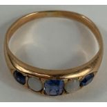 An early 20th century sapphire and opal five stone