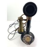 An early 20th century stick telephone, with brass